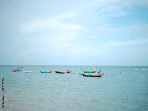 Group small fishing boat parking on the sea