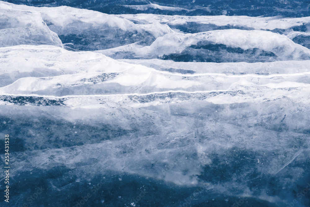 Texture of ice cracks. Winter background. Texture of ice cracks. Winter background.