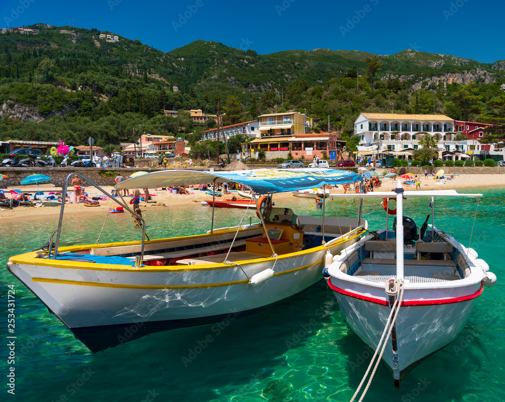 Tourists queue for boats in Palaiokastritsa, Corfu