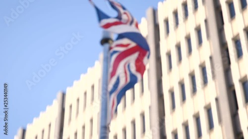 British flag flies majestically in high wind close up in slow motion