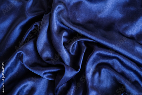 Fabric blue waves - material for background and texture.