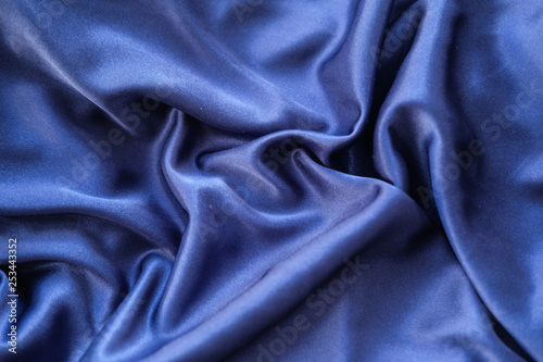 Fabric blue waves - material for background and texture.