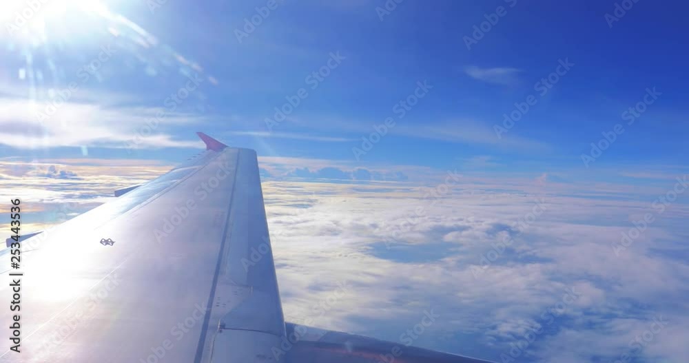 Passanger airplane flies in high sky view from window Passanger airplane flies in high sky view from window
