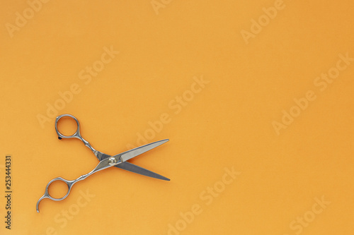 Stylish Professional Barber Scissors, Hair Cutting on black background. Hairdresser salon concept, Hairdressing Set. Haircut accessories. Copy space image, flat lay