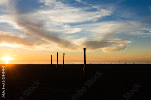 Sunset over beach vollybal courts in Hermosa Beach California