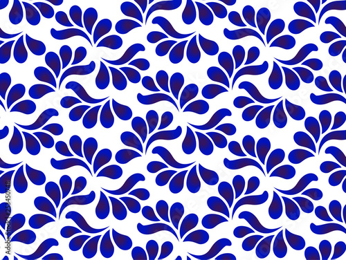 blue and white ceramic pattern with leaves photo