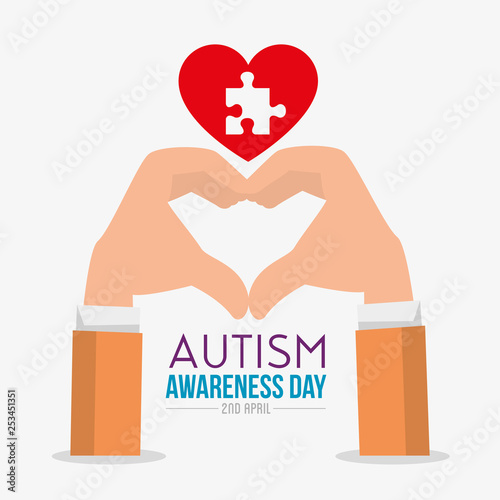 man hands with shape heart to autism day