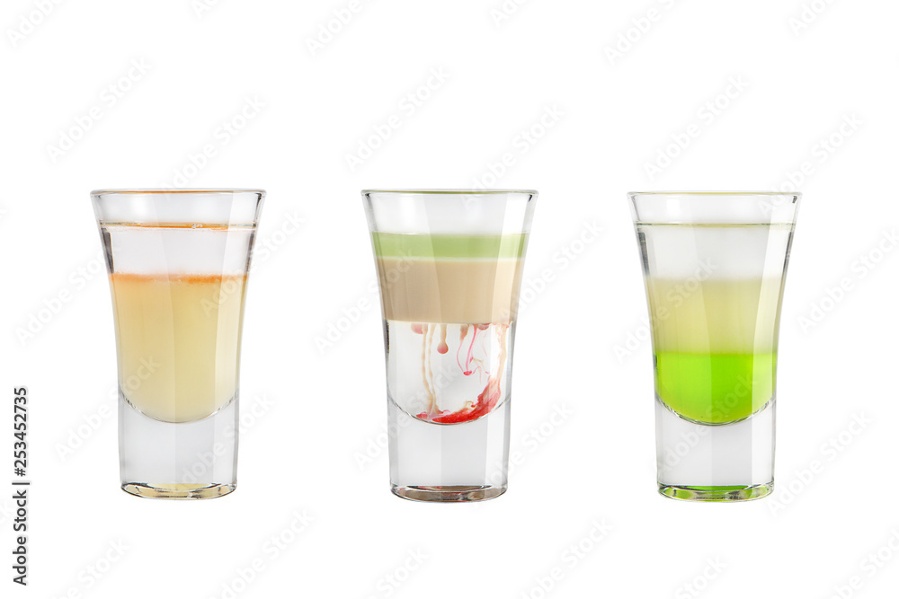 Alcohol shots on a white background. Three popular tequila shots. Alcohol shots on a white background. Three popular tequila shots.