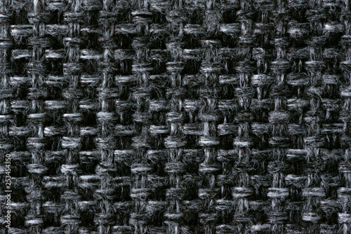 Macro photo of gray fabric textile texture background.