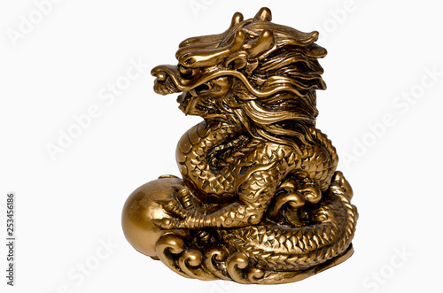 Dragon statue gold white background