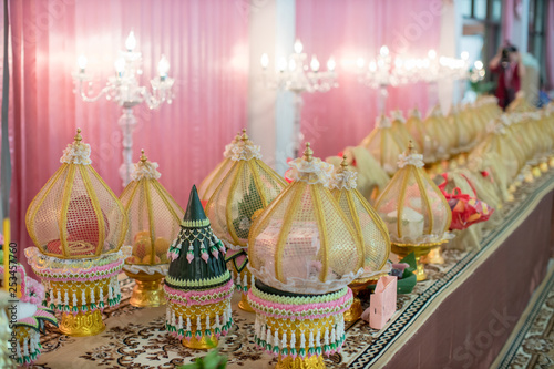 Bride price set in deluxe plate in Thai wedding ceremony. traditional wedding ceremony. image for background, wallpaper, objects, article, illustration and copy space. © kanpisut