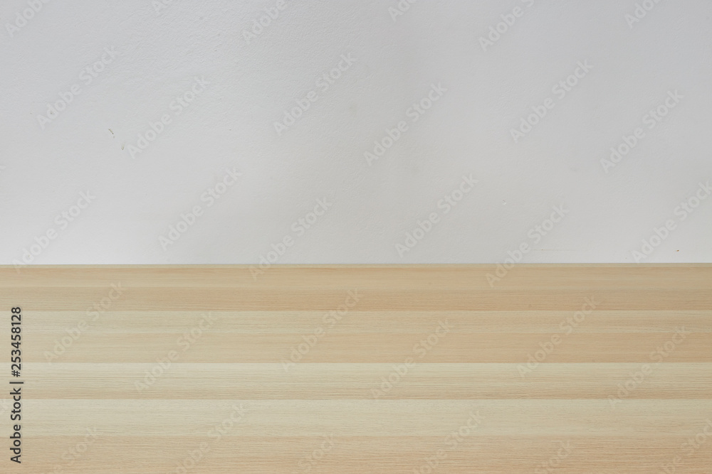 Empty light brown table in white room