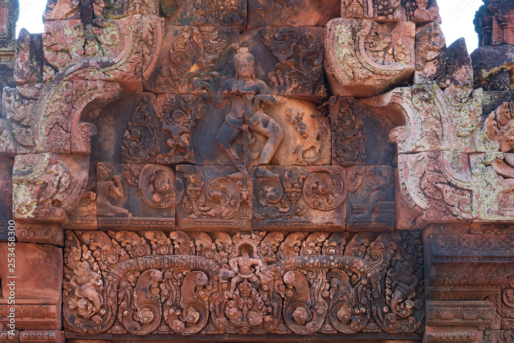 Dancing god Shiva relief on Gopuram's pediment of Banteay Srei Temple, Cambodia