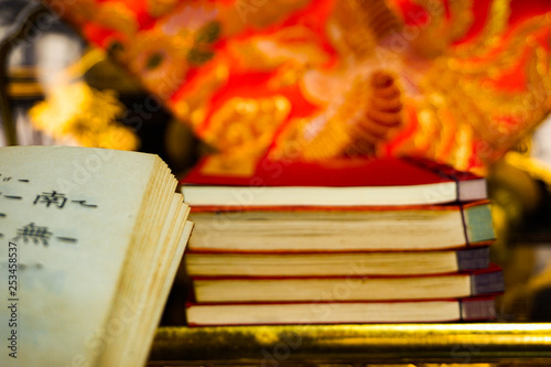 books of sutras lying in a Buddhist altar. 仏壇にあるお経の本