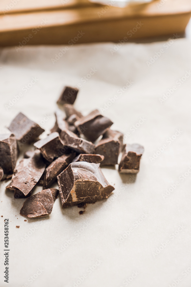 Grated chocolate on the table. Selective focus. Grated chocolate on the table. Selective focus.