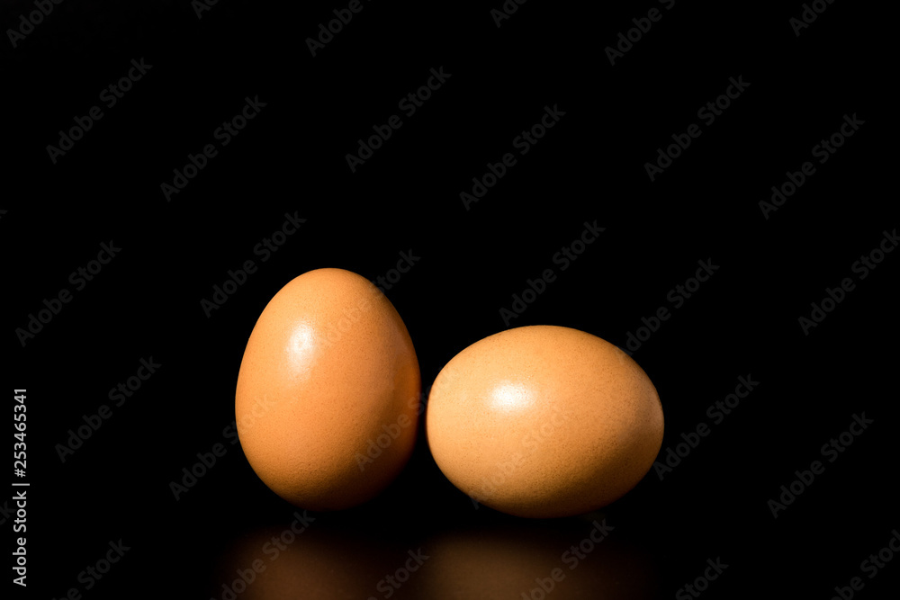 golden egg on black background golden egg on black background