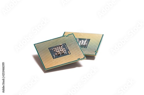 two computer micro chips isolated on white background. pc processor isolated.