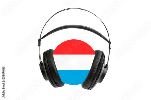 Photo of a headset with a CD with the flag of Luxembourg
