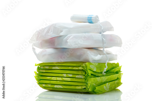 Clean white cotton tampon and pads isolated on a white.  Woman hygiene protection in period. Menstruation cycle, critical days concept.