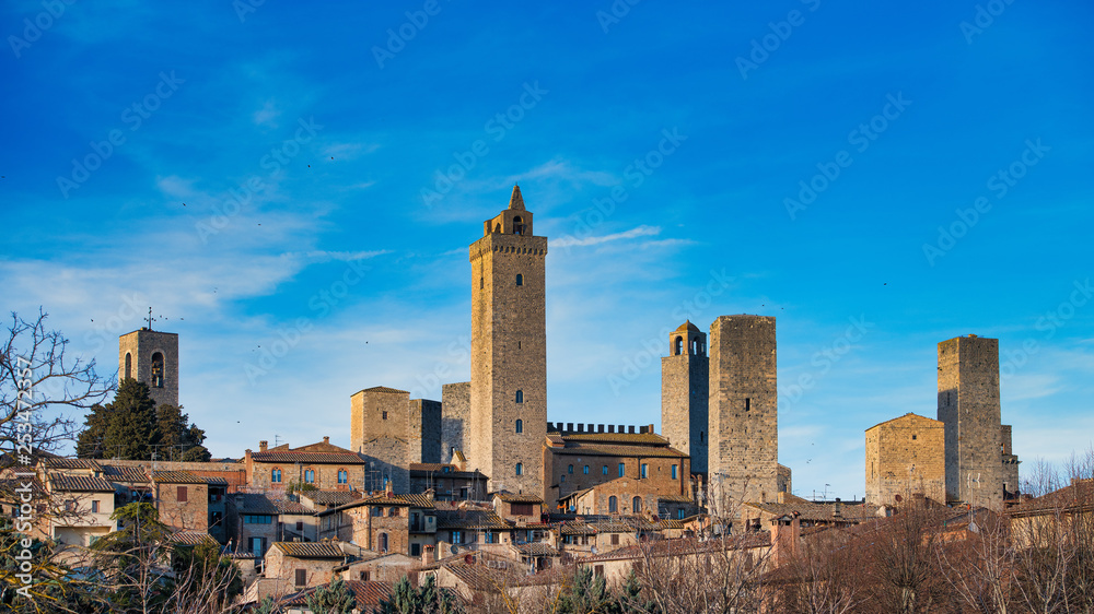 The medieval village of San Gimignano with its famous towers. in tuscany Italy