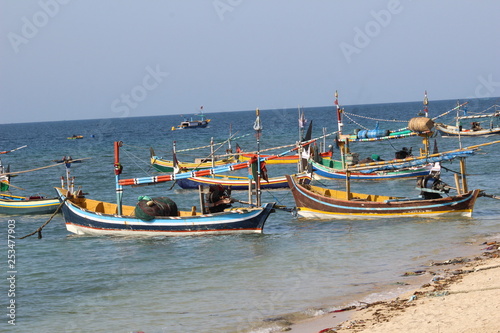 colorful fishing boats on the beach