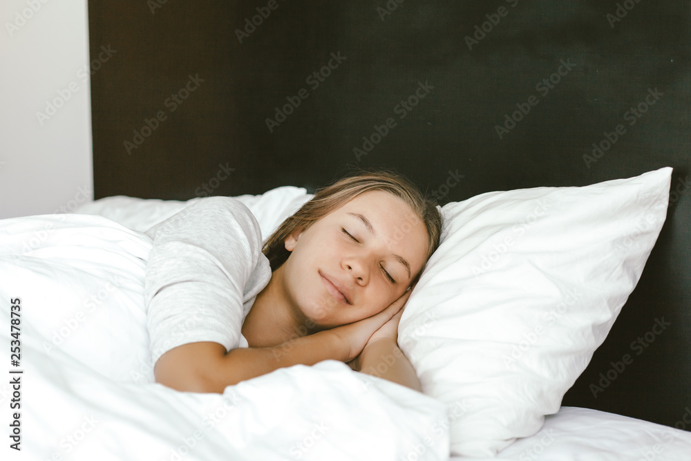 Girl Sleeping In Bed In Hotel Room Stock Adobe Stock girl-sleeping-in-bed-in-hotel-room-stock-adobe-stock
