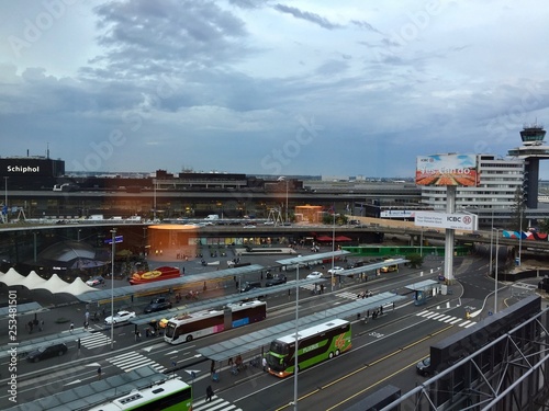 Photography Schiphol airport and control tower seen through the window of a hotel room