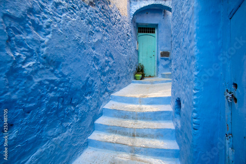 Street with blue walls in Chefchaouen in Morocco © Marko Rupena