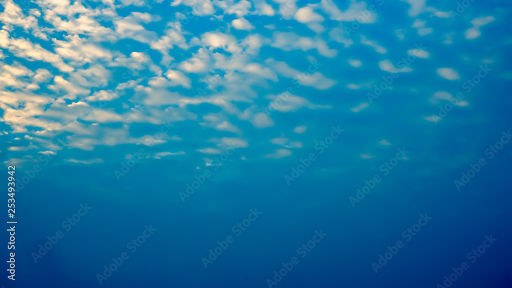 white clouds with blue sky in background, clouds in horizon blue sky