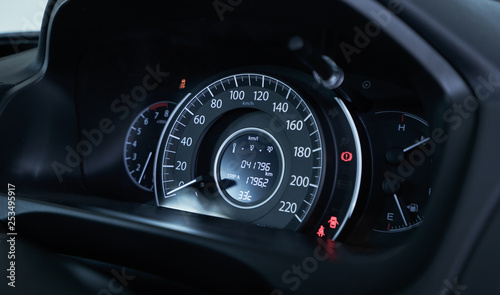 Close up of modern speedometer display in a car dashboard panel . © jamesteohart