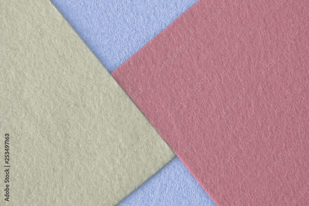 Pieces of coloured felt. Red, yellow and blue color composition. Colorful felt texture for background with copy space. Pieces of coloured felt. Red, yellow and blue color composition. Colorful felt texture for background with copy space.