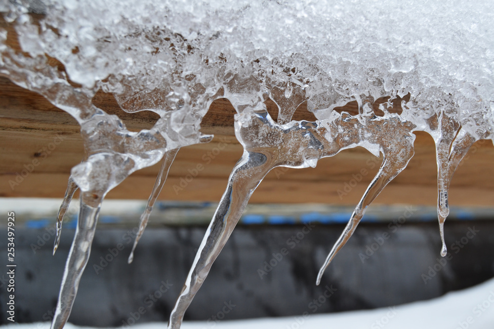Icicles hanging from the roof