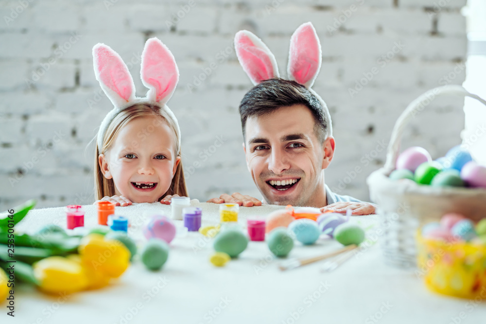 I love my dad for having dressed a rabbit costume with me.Lovely family preparing for Easter together. I love my dad for having dressed a rabbit costume with me.Lovely family preparing for Easter together.
