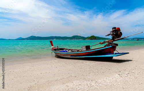 The fishing boats moored along the shore.