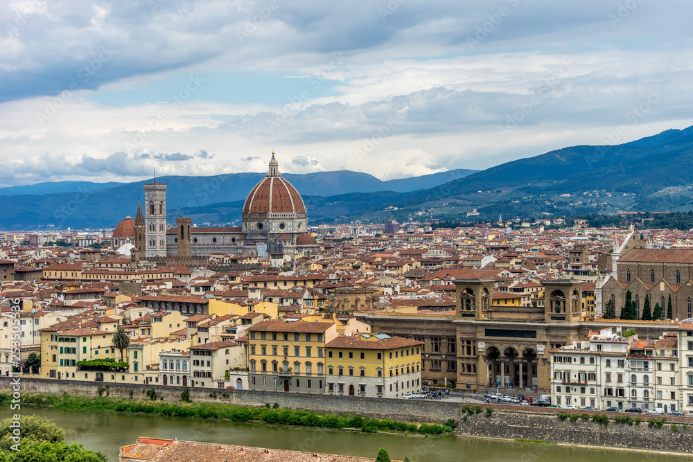 Panaromic view of Florence townscape cityscape viewed from Piazzale Michelangelo (Michelangelo Square) with magnificent Renaissance dome designed by Filippo Brunelleschi