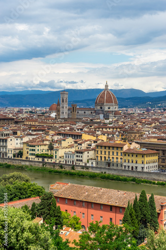 Panaromic view of Florence townscape cityscape viewed from Piazzale Michelangelo (Michelangelo Square) with magnificent Renaissance dome designed by Filippo Brunelleschi