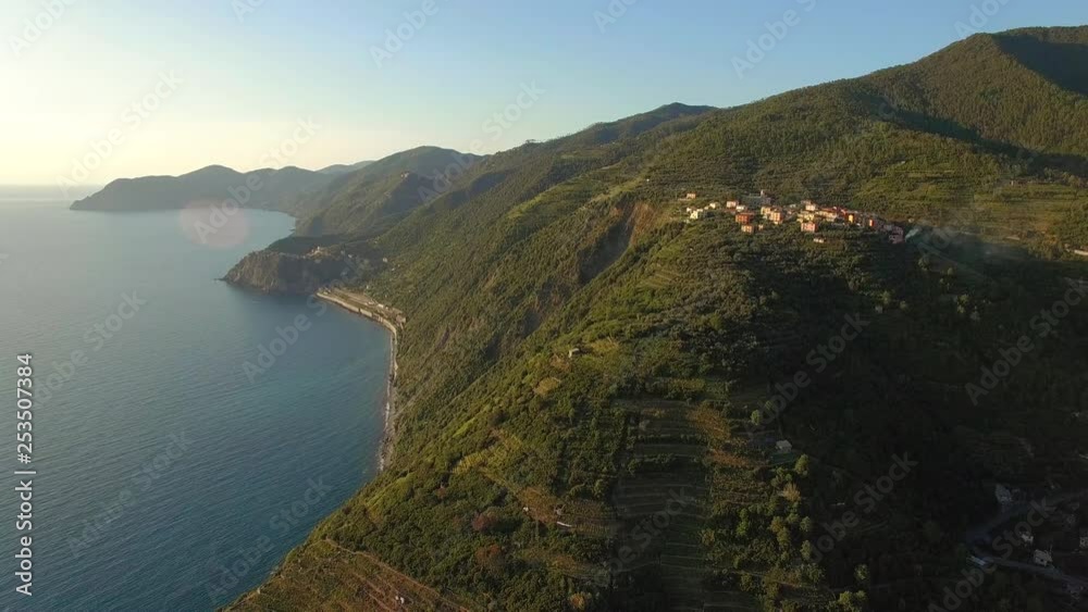 Sunset along the coast of Italy at Cinque Terre. High altitude aerial shot. Sunset along the coast of Italy at Cinque Terre. High altitude aerial shot.