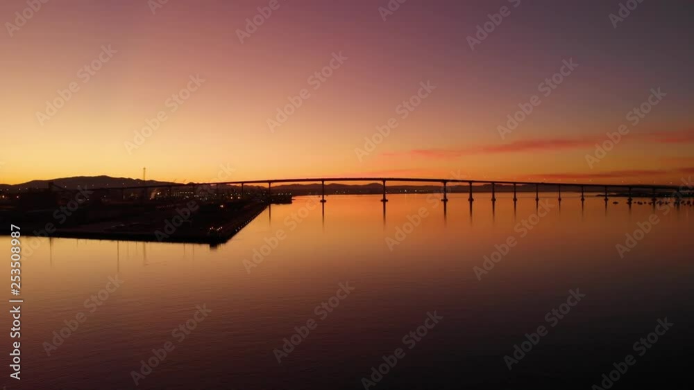 San Diego Coronado Bridge Skyline Overlook Aerial from Pier at Sunrise San Diego Coronado Bridge Skyline Overlook Aerial from Pier at Sunrise