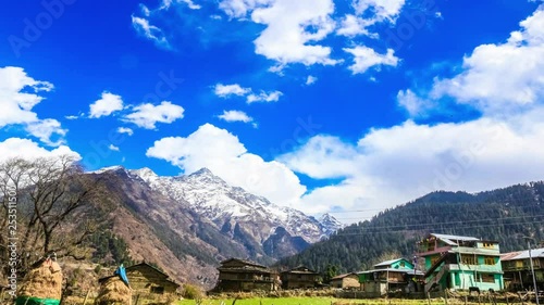 A beautiful winter timelapse of mountains and clouds of tosh,india. photo