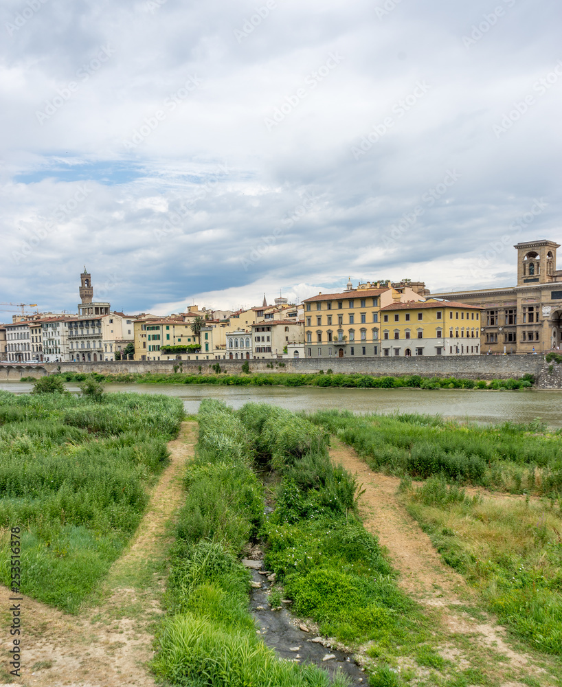 Italy,Florence, a castle on top of a grass covered field