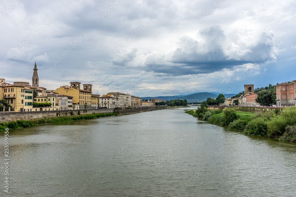 Italy,Florence, Arno, a castle surrounded by a body of water with Arno in the background
