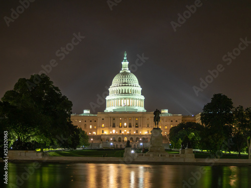 Washington DC, District of Columbia, Summer 2018 [United States US Capitol Building, night view with lights over reflecting pond, park fountain]
