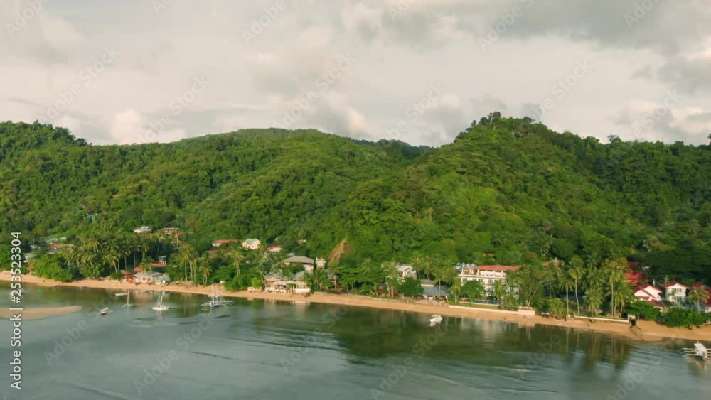 Drone flying alongside the beaches of El Nido, Philippines. Drone flying alongside the beaches of El Nido, Philippines.