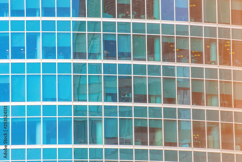 Background of glass windows of modern office building Background of glass windows of modern office building