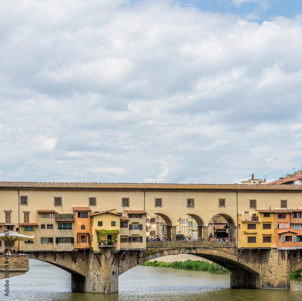 The Ponte Vecchio over the Arno River in Florence, Italy The Ponte Vecchio over the Arno River in Florence, Italy
