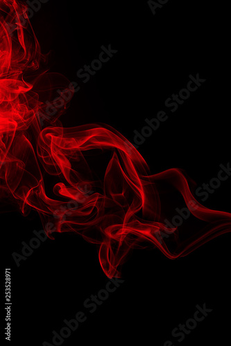 Fire of red smoke abstract on black background. fire design, darkness concept