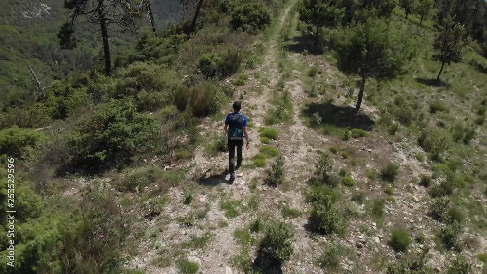 Aerial View of hiker in South of France, close to Levens. Photographer used the automatic tracking system of the drone. Aerial View of hiker in South of France, close to Levens. Photographer used the automatic tracking system of the drone.