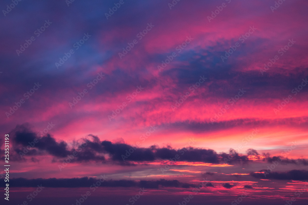 abstract sunset sky background with wind clouds