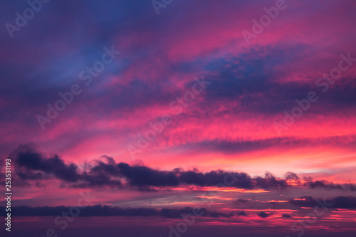 abstract sunset sky background with wind clouds