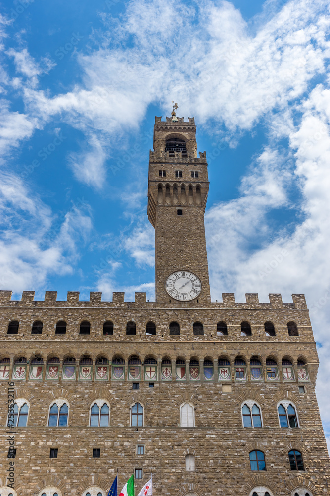 Italy,Florence, Palazzo Vecchio, a large clock tower in front of Palazzo Vecchio